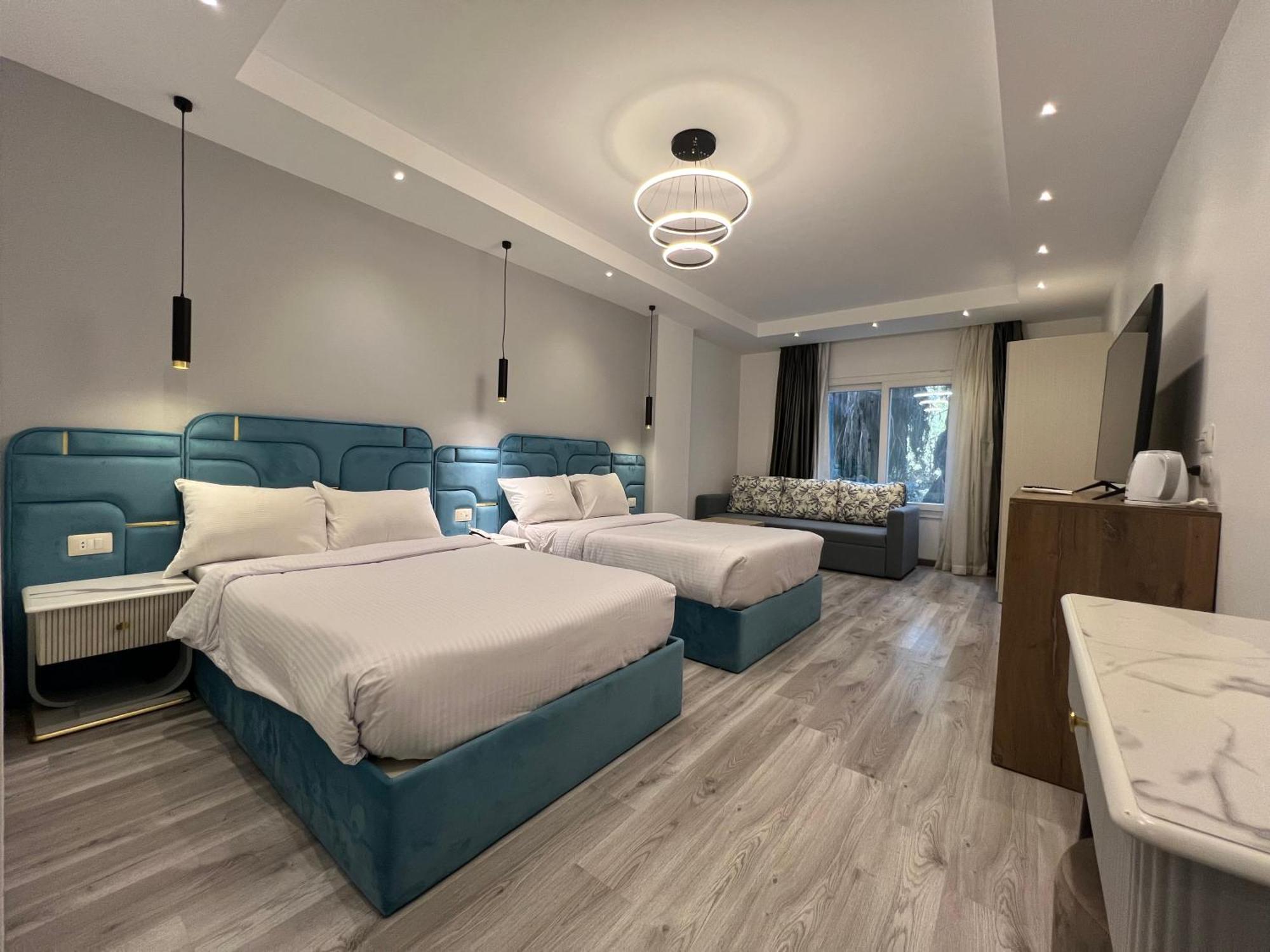 Onyx Pyramids Boutique Hotel Al Kawm al Akhdar Bagian luar foto